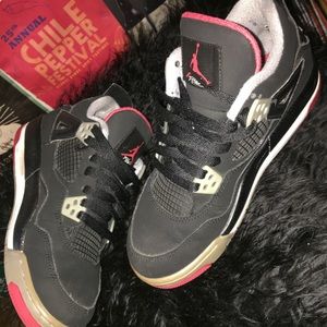 Black/Red Jordan 4s